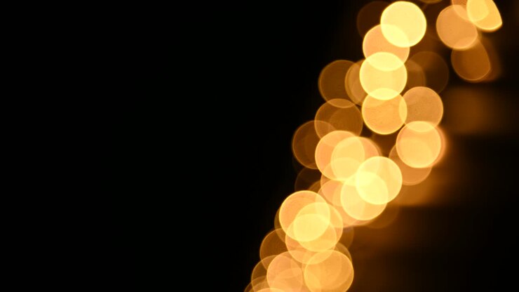 Luci dorate di Natale sullo sfondo bokeh