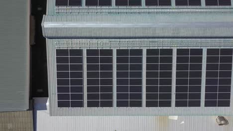 Aerial-View-of-Large-Scale-Solar-Panels-on-Modern-Factory-Roof