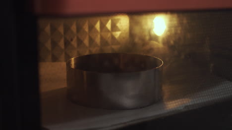 circular baking  pan inside oven