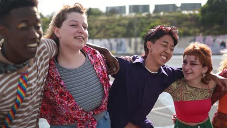 young diverse people having fun outdoor laughing together