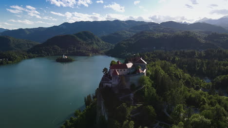 Stately-Bled-castle-on-precipice-above-city-of-Bled,-Slovenia