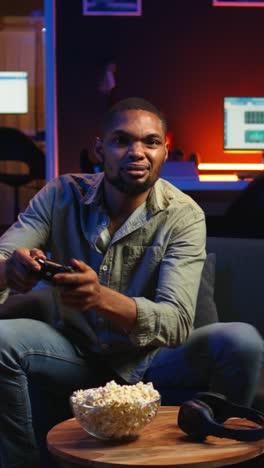vertical video african american angry player being frustrated about his lost competition