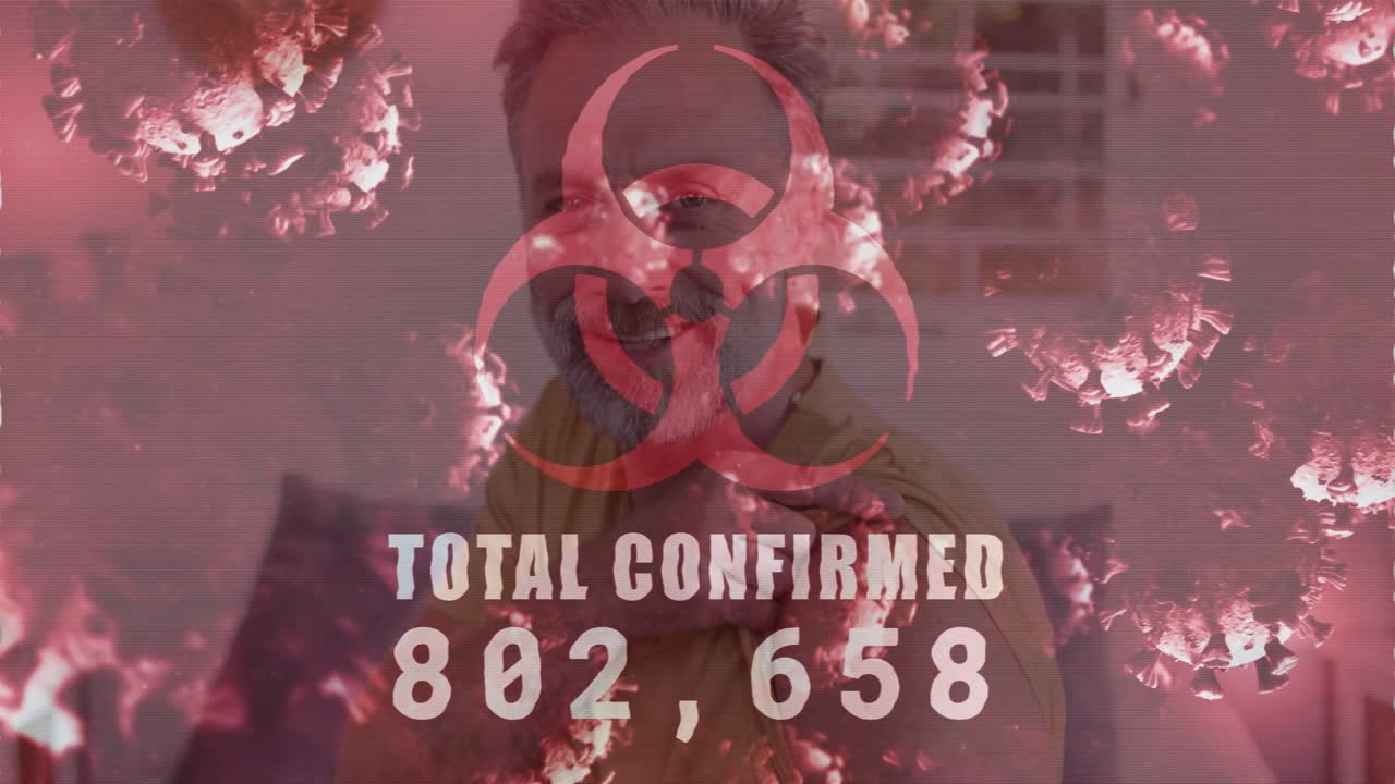 Man reacting to rising health counter, rolling sleeve, holding arm under translucent virus overlay