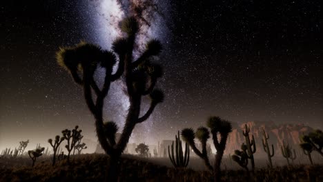 hiperlapso en el parque nacional del valle de la muerte desierto iluminado por la luna bajo las estrellas de la galaxia