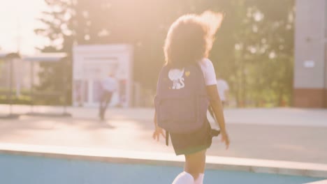 schoolgirl running in park