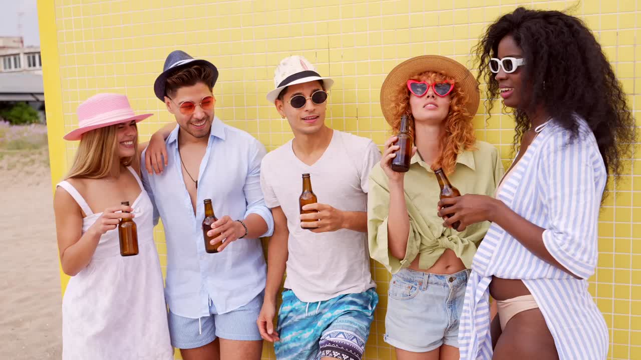 Group of young people having fun at the beach
