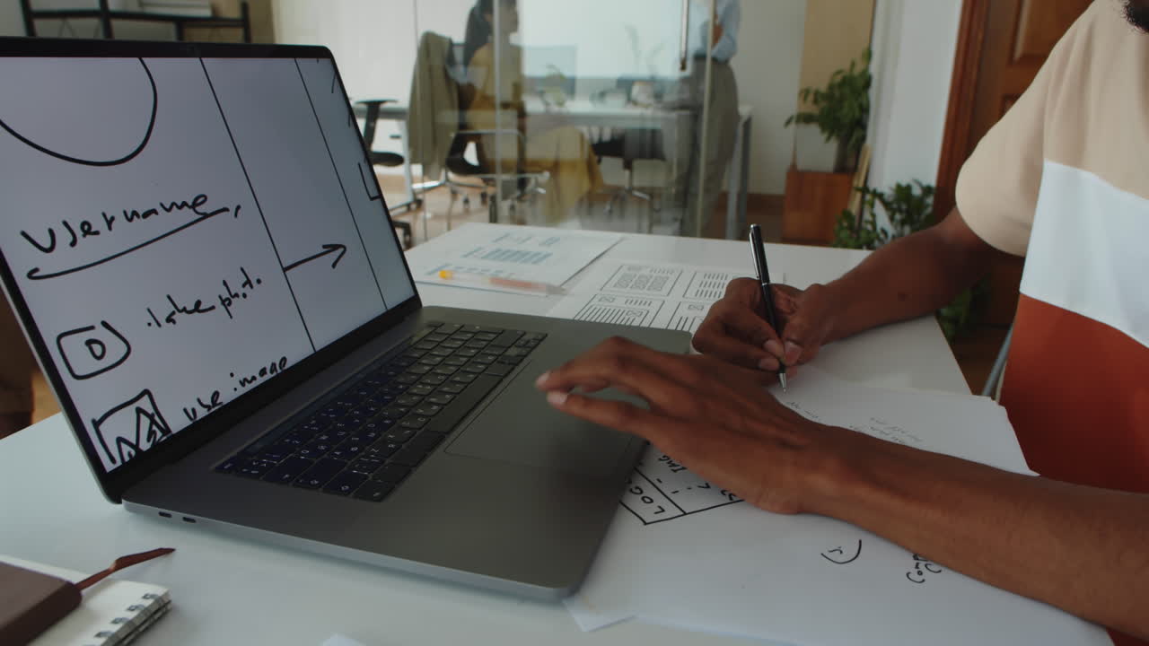 UI Designer Developing Interface for Mobile Application