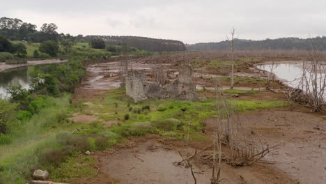 Aerial-Drone-Fly-Above-Rubín-Marsh-Ruins-Landscape-in-Cantabria-Spain-Flooded-Land-Between-Rivers,-San-Vicente-de-la-Barquera