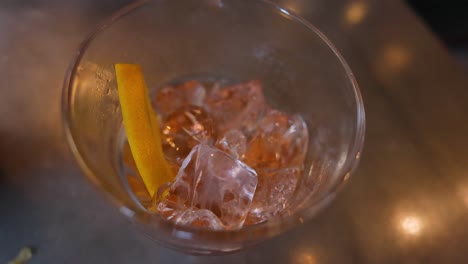 lemon slice in iced drink on table