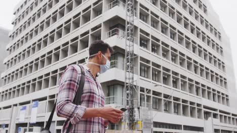 side view of caucasian man on the go wearing a corovirus covid19 mask