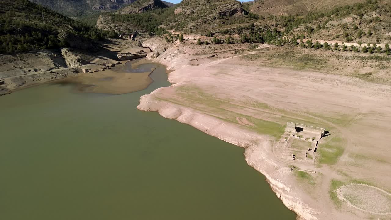 Aerial View of a Dry Reservoir with Ruins in Spain