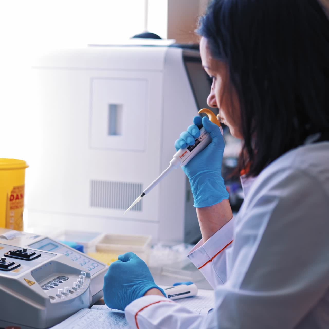 Serious chemist working in laboratory