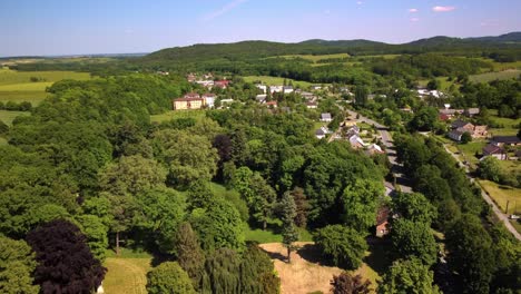 panoramic gorgeous landscape containing an idyllic czech republic jindrichov ve slezku, village in a lush green valley in