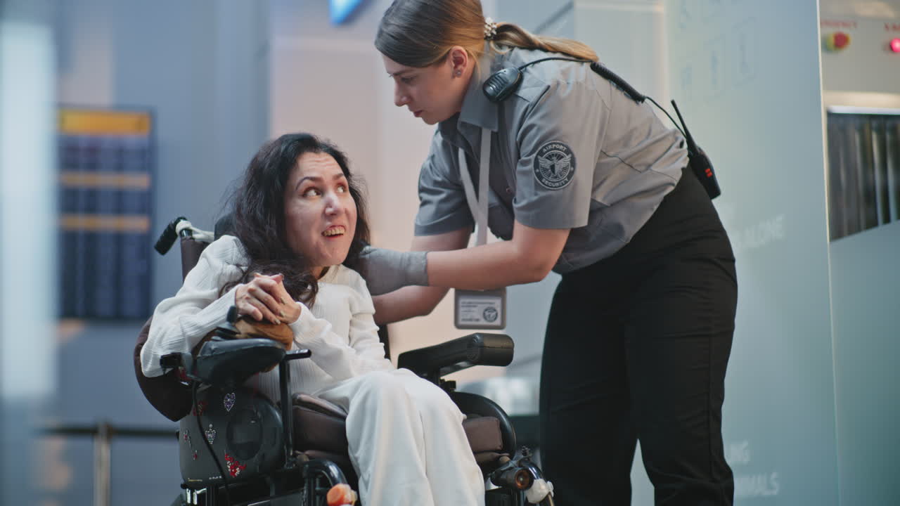 Airport Security Assisting Disabled Passenger
