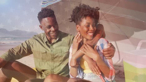 animation of flag of usa over african american family at beach