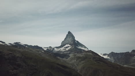 cervin, zermatt, drone view of a rocky and steep mountain summit, drone aerial landscape view, nature