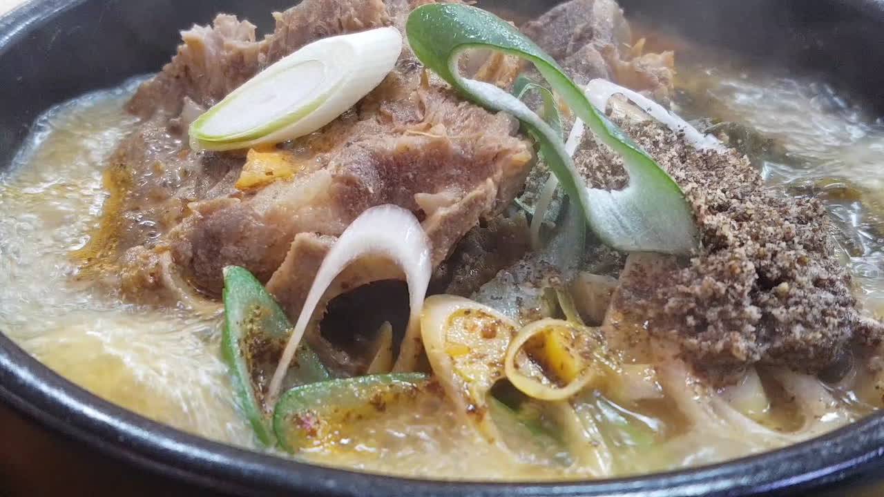 Korean Pork bone Soup served on hotpot. Sometimes called hangover soup.