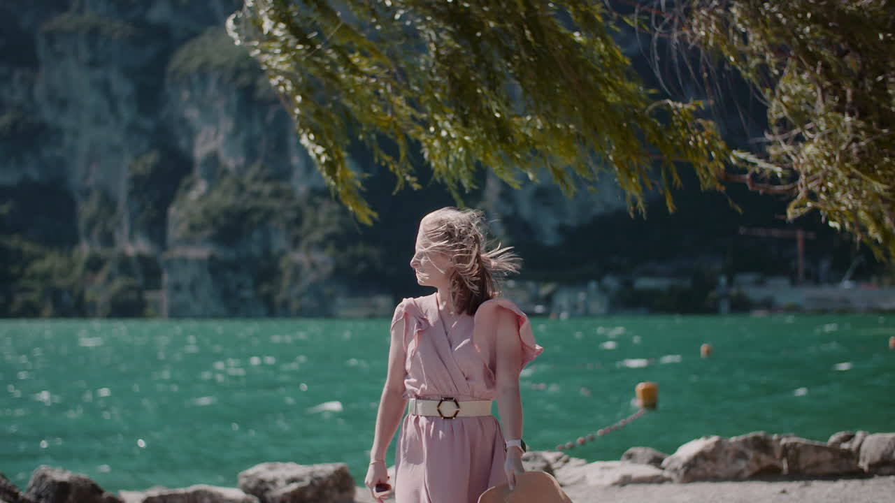 Woman Walking Along Scenic Coastal Path