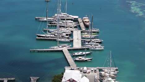 aerial view of a luxurious marina with yachts and sailboats