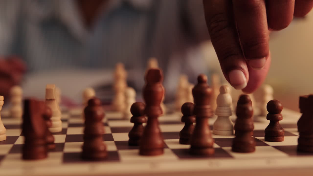 Chess Player Makes A Strategic Move