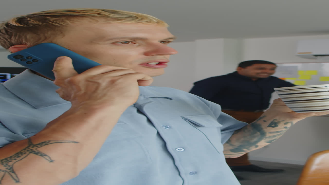 Project Manager Calling Client at Office