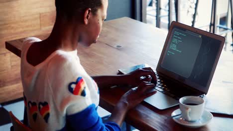 female executive using laptop at desk