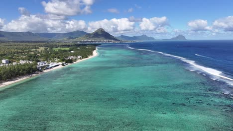 aerial view of mauritius coastline with mountains and turquoise ocean