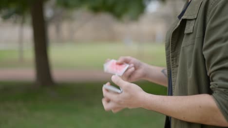 card magic performance in a park