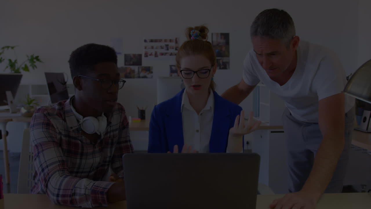 Animation of diverse business people using laptop in office