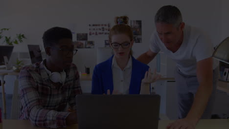 animation of diverse business people using laptop in office