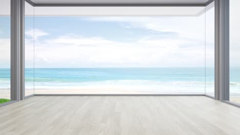 바다를 볼 수 있는 럭셔리 여름 해변 집의 큰 거실은 큰 유리 창문과 나무 바닥을 가지고 있습니다.