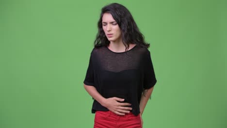 young beautiful woman having stomach ache