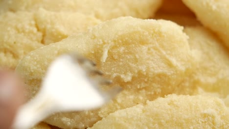 close-up of a pile of light-colored pastries