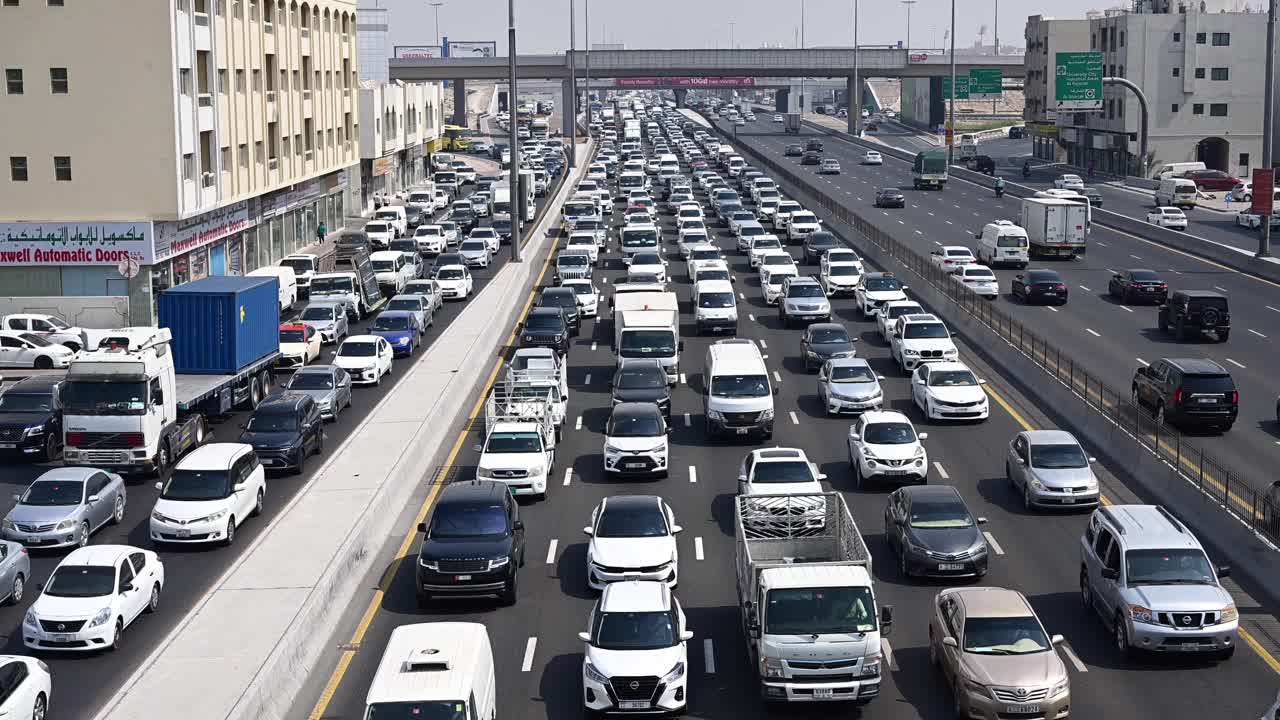 Slow-moving traffic on Sheikh Mohamed bin Zayed Road heading towards Dubai from Sharjah National Paints in the UAE