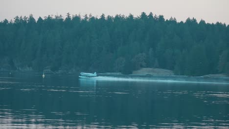 Float-Plane-taking-off-at-sunrise,-Vancouver-Island