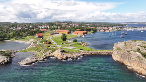 scenic village, ocean and lake in vestfold og telemark, norway - aerial drone shot