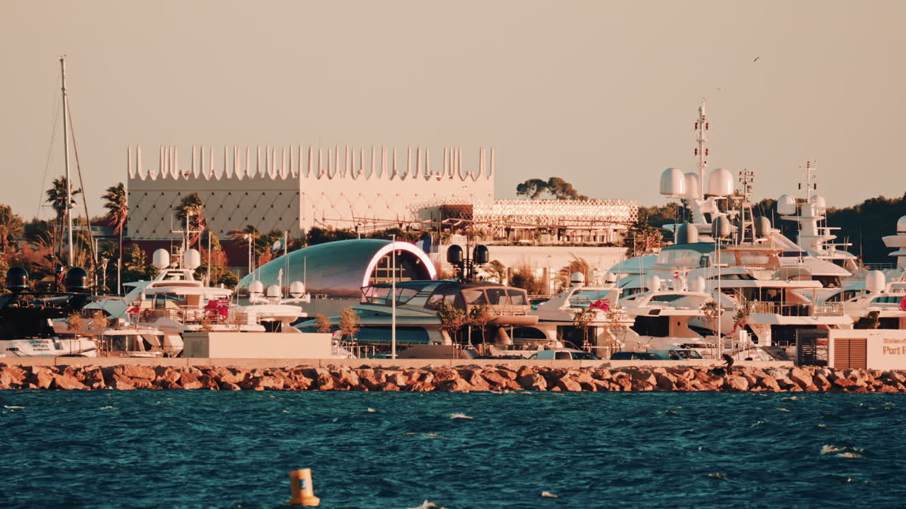 Luxury yachts and sailboats moored in the marina of Cannes, France