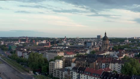 drone aerial flight over neustadt mainz germany from the east showing christus church and dome of mainz