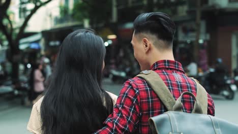 handheld video shows of young couple in the city