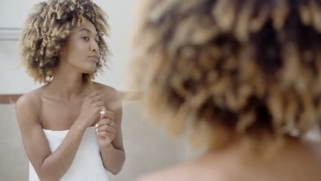 Woman-In-Front-Of-The-Mirror