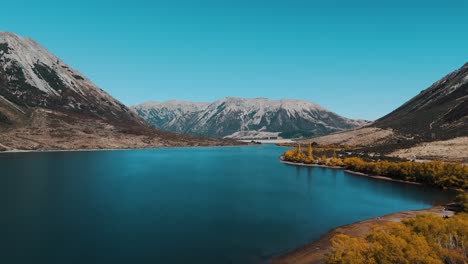 panoramic aerial view of lake pearson in the waimakariri basin at arthur’s pass.