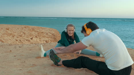 young people having training on the sea shore