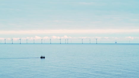 offshore wind farm at wind energy power plant, a sustainable renewable energy way of generating electricity in the ocean and sea