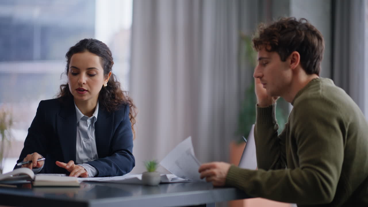 Professional advisor consulting man in glass office closeup. Lawyer consultation