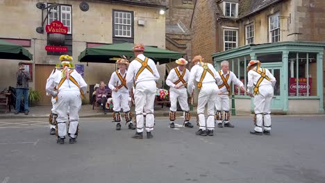 rutland morris men performing in uppingham market place of music and folk dancing with a range of traditional folk dancing