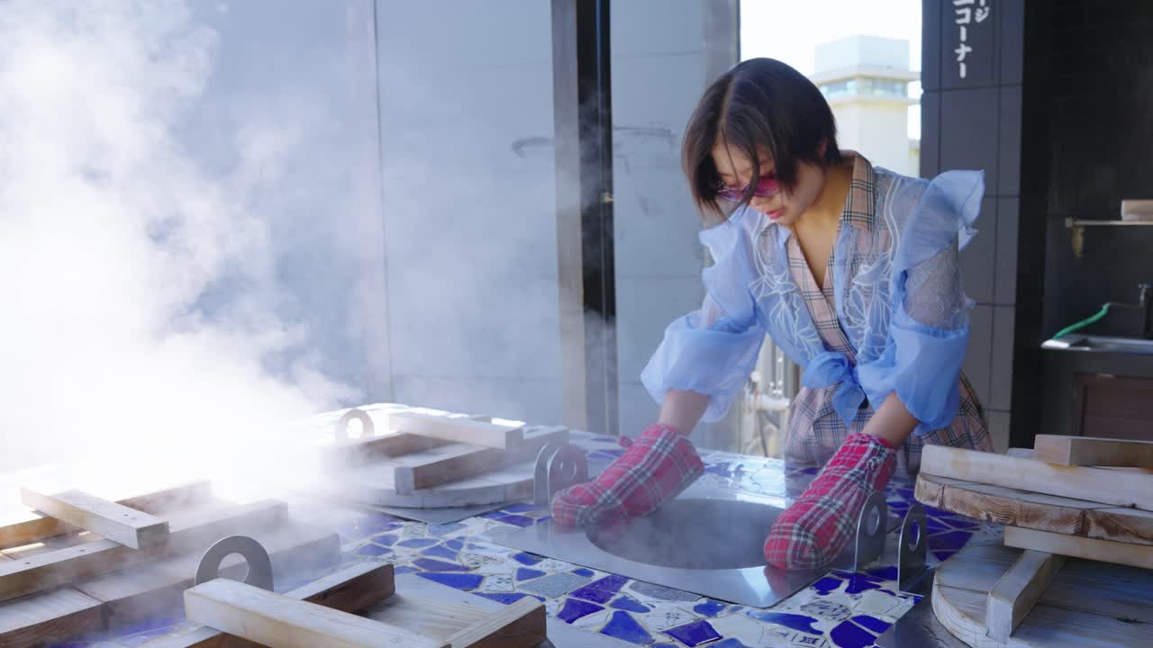 Japanese Woman Cooking Vegetables, Onsen Tamago, and Seafood in Jigokumushi