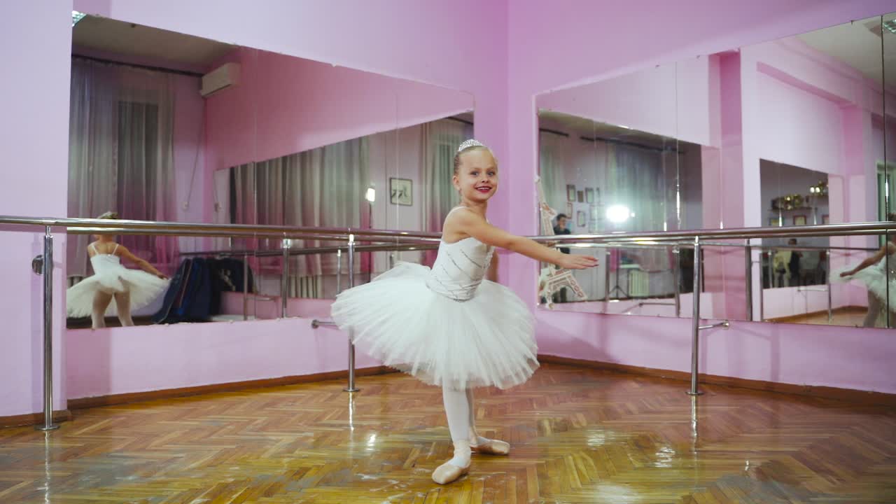 Graceful girl practicing ballet in the Studio. Ballerina. Slow motion