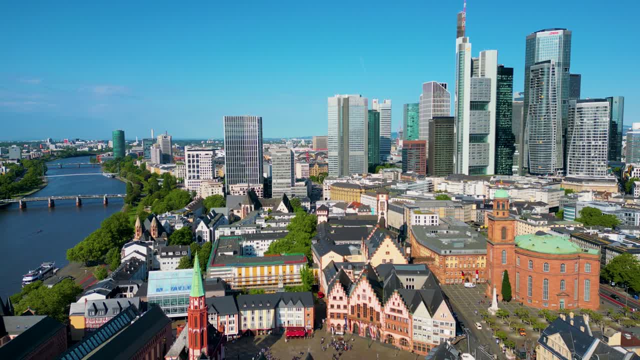 4K Aerial Drone Video of Modern Skyscrapers Overlooking the Historic Römerberg Town Square in Downtown Frankfurt, Germany
