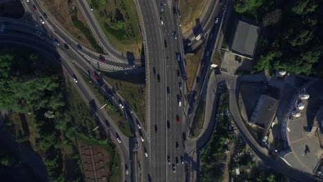 drone view car driving on freeway overpass.. car traffic on highway intersection