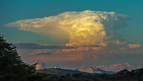 cloudscape of a cumulonimbus cloud over mount olympos, cyprus - sunset time lapse